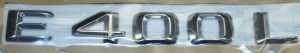 NEW GENUINE MERCEDES BENZ E CLASS REAR TRUNK E 400L LETTERING CHROME BADGE A2128176915