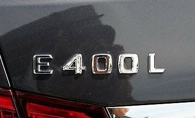 NEW GENUINE MERCEDES BENZ E CLASS REAR TRUNK E 400L LETTERING CHROME BADGE A2128176915 - Image 3