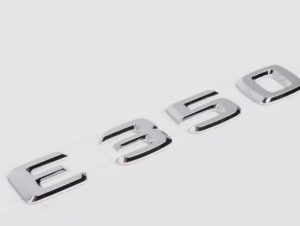 NEW GENUINE MERCEDES BENZ MB E CLASS W207 W212 REAR TRUNK E350 EMBLEM BADGE A2118170315