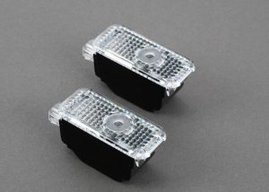 NEW GENUINE AUDI A4 A6 A7 TT Q3 Q7 DOOR ENTRY LED PUDDLE LIGHTS S-LINE RED LOGO 4G0052133J