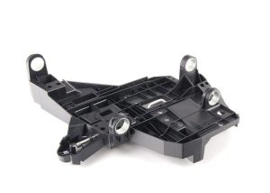 NEW GENUINE PORSCHE CAYENNE 2007-2010 HEADLIGHT MOUNTING BRACKET LEFT N/S 95563104300