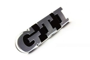 NEW GENUINE VW GOLF POLO CHROME BLACK GTI GRILL BADGE EMBLEM 1K6853679D FXC
